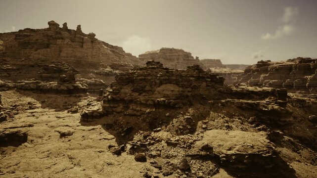 golden hour mesa panorama drenched warmth, soft shadows and layered plateaus, distant bluff under gradient sky, calm cinematic scene for travel, advertising,