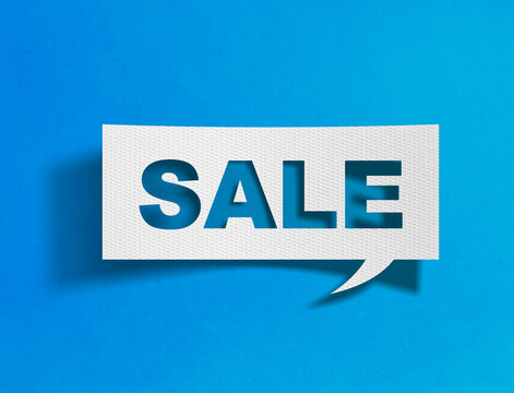 Sale speech bubble on blue background with paper cutout design