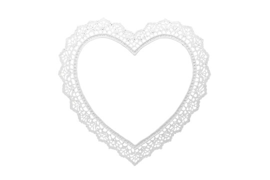 Ornate white heart shaped lace border with pointed lower detail
