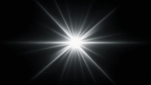 Mesmerizing brilliant starburst animation emerging from darkness with glowing light effects for dynamic visual impact