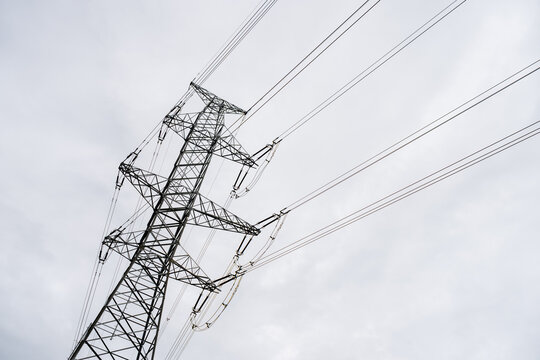 High capacity electrical transmission tower network delivering bulk energy power, highlighting utility asset management and grid modernization