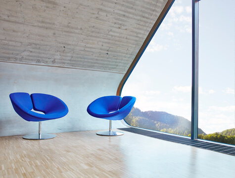 Two chairs in empty attic office