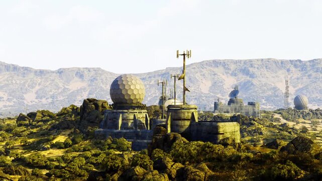 radar domes on sunlit desert outpost, sprawling antennas and concrete bunkers nestled on arid hillside, distant mountains under hazy sky, warm golden light