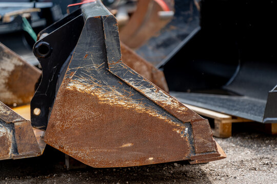 Industrial excavator cleanout bucket attachment with quick coupler mounting bracket for precision ground levelling and ditching