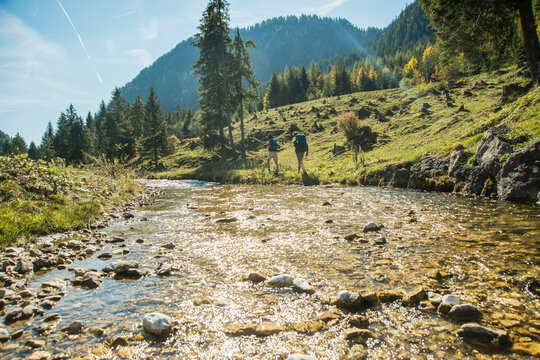 Austria, Tyrol, Tannheimer Tal, young couple hiking