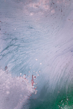 The picture is painted in alcohol ink. Creative abstract artwork made with translucent ink colors. Trendy wallpaper. Abstract painting, can be used as a background for wallpapers, posters, websites.