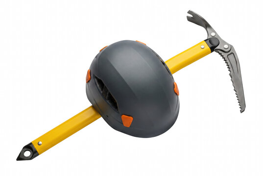 Ice axe piercing through a grey climbing helmet