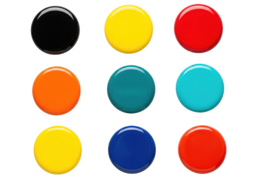 A grid of nine glossy, colorful circular buttons arranged in three rows against a solid black background, featuring black, yellow, red, orange, teal, cyan, and blue colors