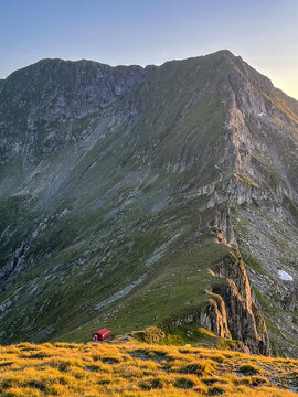 high mountain landscape, sunset to Moldoveanu and Vistea Peaks, Fagaras Mountains, Romania 