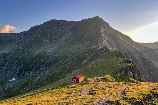 hiking in the mountains, sunset from Vistea Saddle, Fagaras Mountains, Romania 