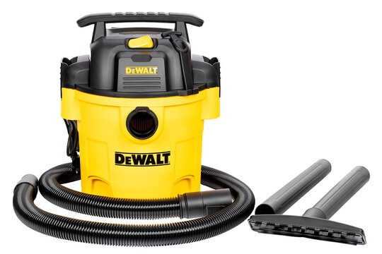 Dewalt wet and dry vacuum cleaner with accessories for home or workshop use on solid surface. Isolated on white background. 08.07.26. Kyiv. Ukraine.