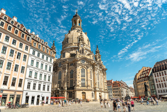 Dresden Frauenkirche and busy Neumarkt square with people, Saxony, Germany