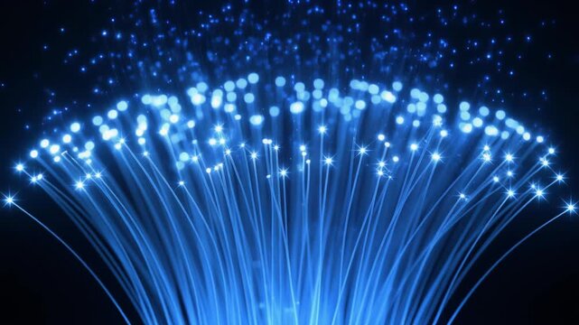 Vibrant blue fiber optic strands fanning out against a dark background, depicting a stunning visual of high-speed data transmission and the future of digital connectivity