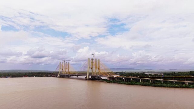 Cable stayed bridge over a wide river under a cloudy sky - July, 2026, Goa, India