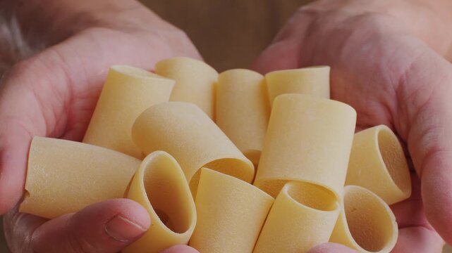 Italian tagliatelle pasta packaging window, Fettuccine pasta, close up, not cooked