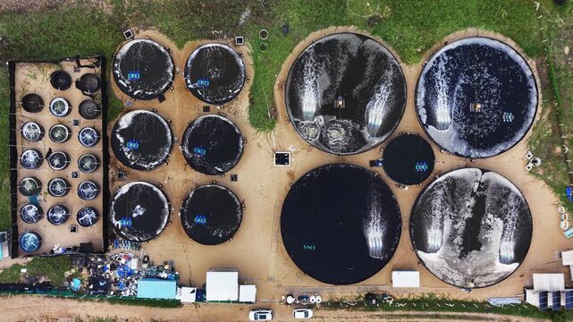Circular clarifier tanks at a municipal sewage treatment plant from above