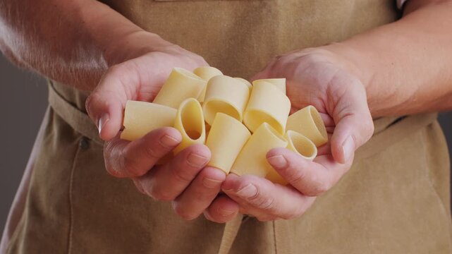 Italian tagliatelle pasta packaging window, Fettuccine pasta, close up, not cooked