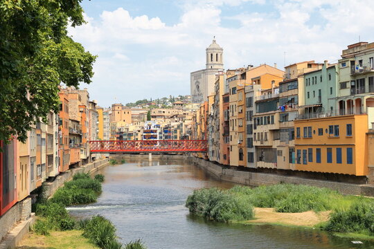 Girona, the old town, red bridge and the river Onyar in Spain.