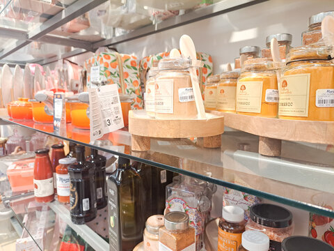 Scented candles and packaged home fragrances line a Marshalls retail shelf in Leesburg.