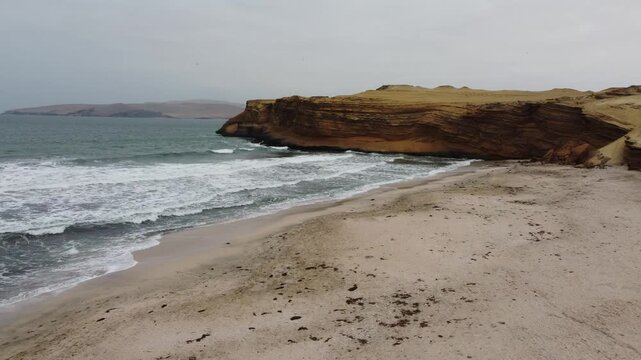 View of la catedral rock formation in paracas national reserve, peru