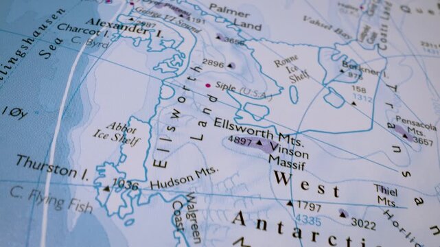 gliding macro view from the amundsen sea to the larsen ice shelf across antarctica on a physical map