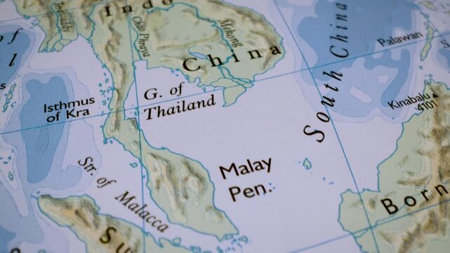 gliding macro view to sumatra, java and borneo on a physical atlas map