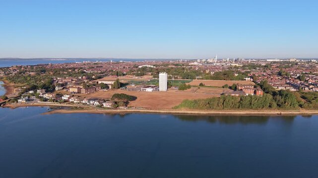 Aerial drone footage of the University of Portsmouth Langstone Campus in Hampshire, England, showcasing university buildings, sports facilities