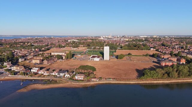Aerial drone footage of the University of Portsmouth Langstone Campus in Hampshire, England, showcasing university buildings, sports facilities