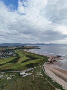 Dornoch is a historic Scottish coastal town beside Dornoch Firth, offering sea views, sandy shores, medieval landmarks, ancient heritage, and open skies.