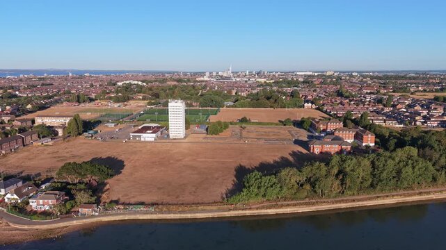 Aerial drone footage of the University of Portsmouth Langstone Campus in Hampshire, England, showcasing university buildings, sports facilities