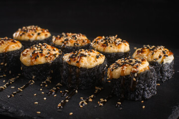 Baked Black Rice Sushi Rolls with Sesame Seeds © Ilias