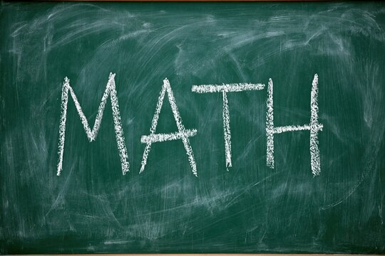 Chalkboard with the word MATH written in white chalk, representing education and learning