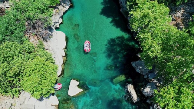 Aerial view of Koprulu Canyon in Manavgat, Antalya, showcasing the dramatic river gorge and lush green forest landscape. Majestic drone shot over Turkey's famous national park.