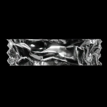 Crumpled clear plastic wrapper isolated on black background