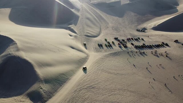 Aerial view of dune buggy safari in huacachina desert