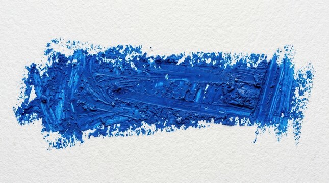 Blue crayon smear on white textured paper
