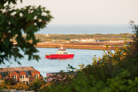 Crew Transfer Vessel CTV Sailing Back From Offshore Wind Farm Construction And Maintenance