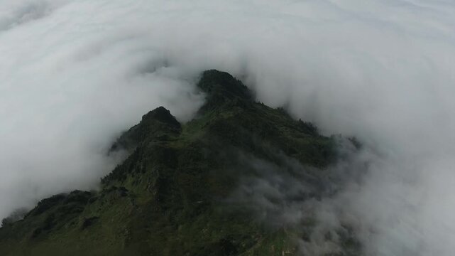Aerial view in Rize Turkey shows sea of clouds around Eastern Black Sea mountain peaks.