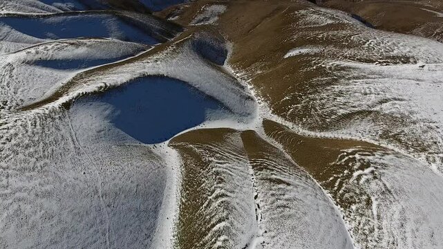 Lares Peru mountain ranges show first snow across cold ridges and high peaks.