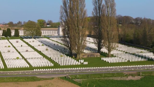 battlefield cemetery tyne cot aerial panorama rows white wwi graves surrounding poplar trees curved memorial wall zonnebeke belgium flanders remembrance lest we forget 1917 war history documentary