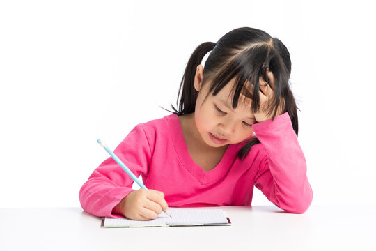 Tired student girl having headache while doing difficult homework