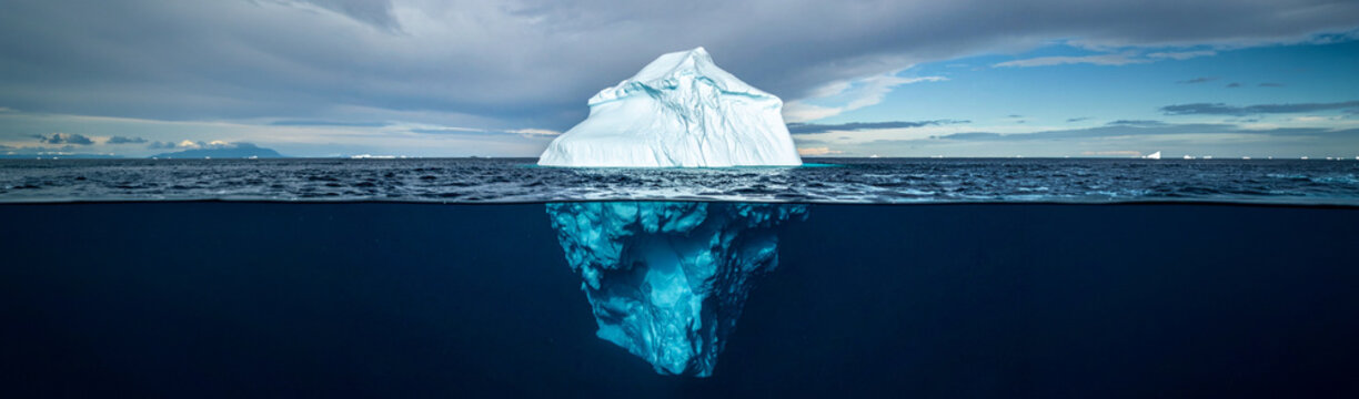 Iceberg Concept: Hidden Risks Lurking Beneath the Surface Wide Dramatic Shot