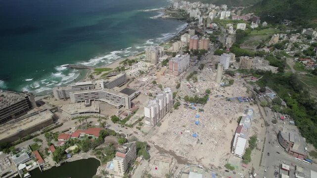 Buildings collapsed in the earthquake, reduced to mountains of concrete rubble Great Housing Mission Venezuela OPP in Caraballeda due to the double earthquake in La Guaira, Venezuela.