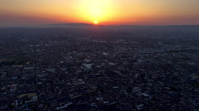 Sun is about to set behind Osaka landscape
