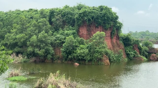 Lush Laterite Cliffs and Lake in Chandaka Forest, Bhubaneswar, India

