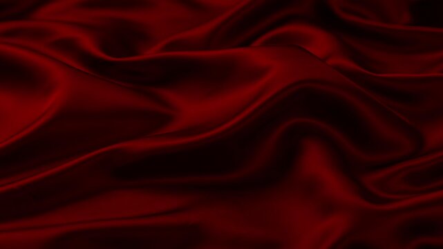Luxury dark red satin silk fabric animation with elegant flowing waves and glossy folds. Seamless looping abstract motion background for premium branding, fashion, romantic themes and cinematic presen