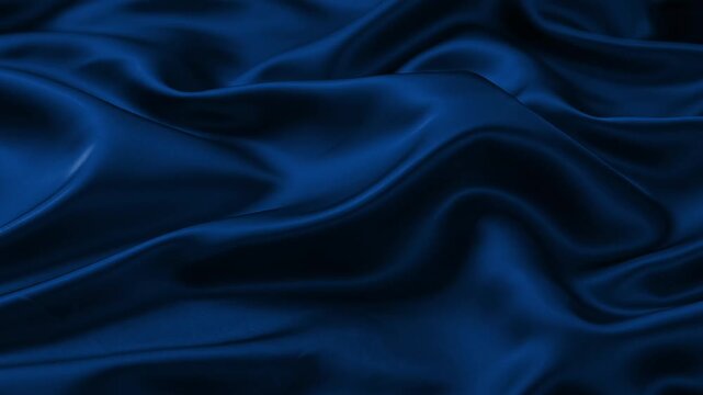Luxury deep blue satin silk fabric animation with smooth flowing waves and glossy folds. Seamless looping abstract motion background for premium branding, fashion, corporate presentations and elegant 
