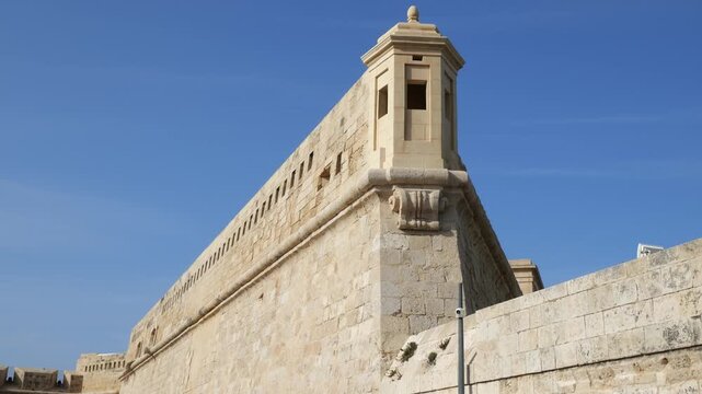 sentry box turret fort st elmo bastion corner stone finial ball pinnacle rampart wall clear sky valletta malta coastal fortification order of st john military architecture 16th century star fort