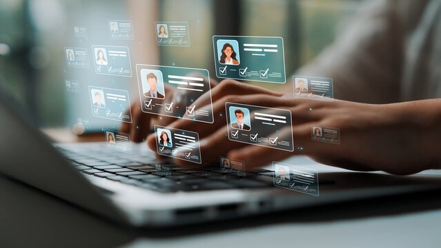 Hands Typing on Laptop with Digital Profiles and Checkmarks Indicating User Interaction and Engagement in a Modern Workplace Environment Sigmoid