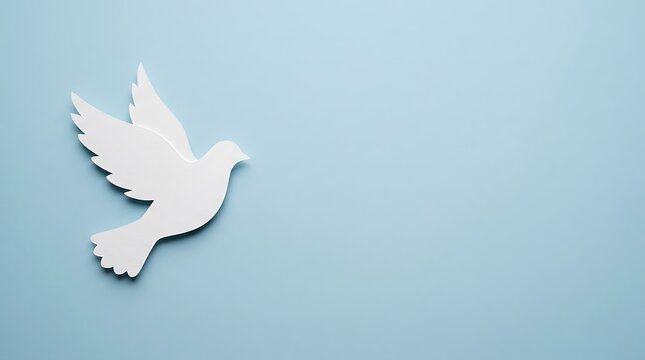White Paper Dove on Blue Background for International Peace Day